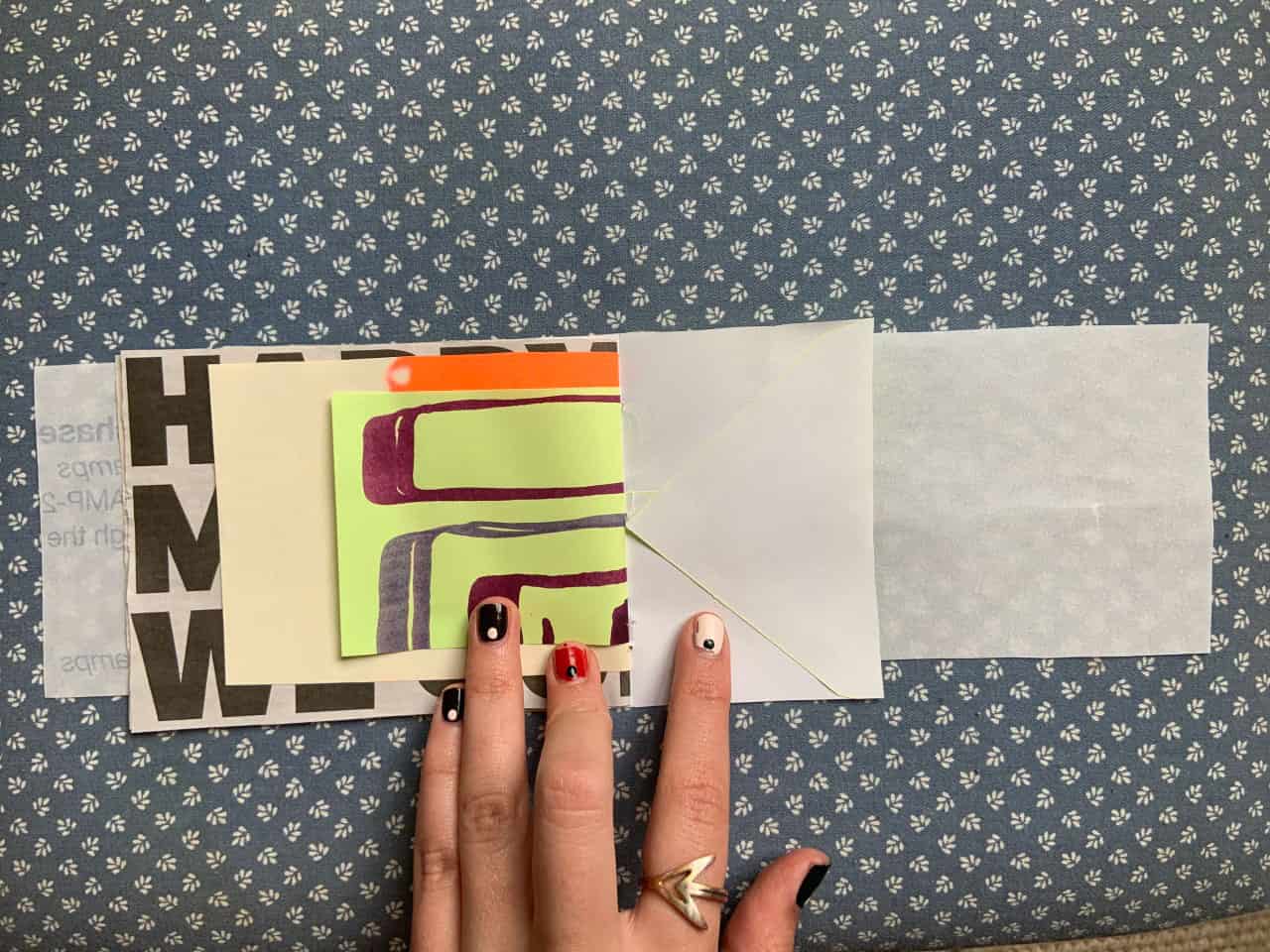 M_A_Charlotte_Jenna_Book_4a hand bound book open to page of chartreuse paper with purple curved lines